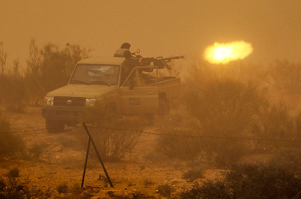 Libya's New Regime: The Fight for Gaddafi's Hometown 105