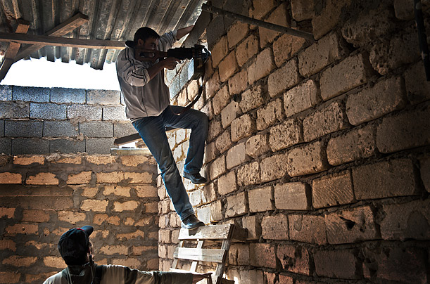Libya's New Regime: The Fight for Gaddafi's Hometown 121