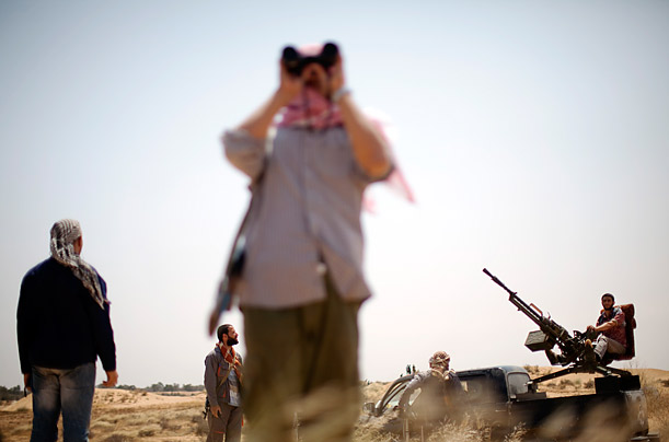 Libya's New Regime: The Fight for Gaddafi's Hometown 127