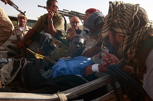 Libya's New Regime: The Fight for Gaddafi's Hometown 14