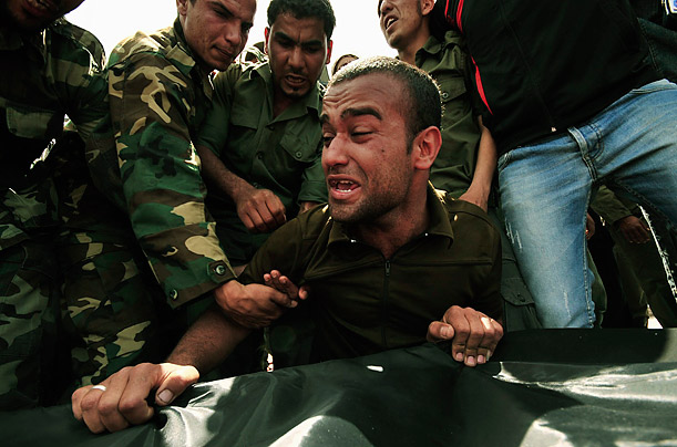 Libya's New Regime: The Fight for Gaddafi's Hometown 143