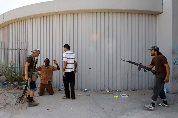 Libya's New Regime: The Fight for Gaddafi's Hometown 51