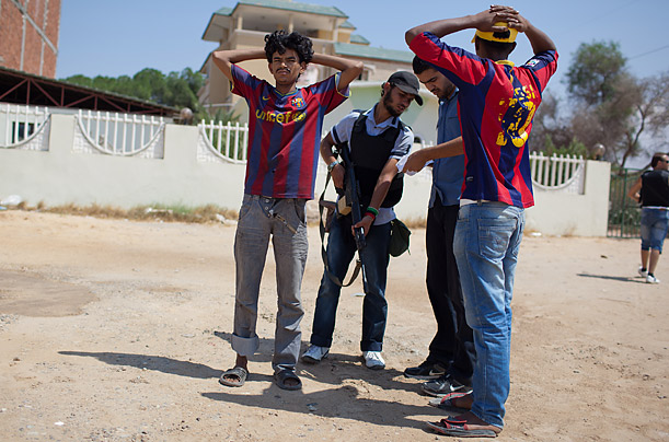 Libya's New Regime: The Fight for Gaddafi's Hometown 56