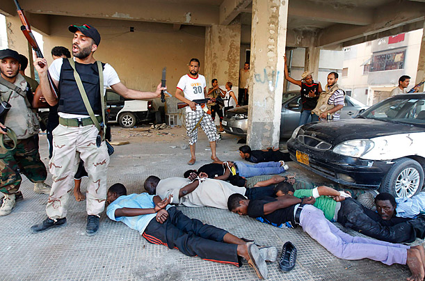 Libya's New Regime: The Fight for Gaddafi's Hometown 59
