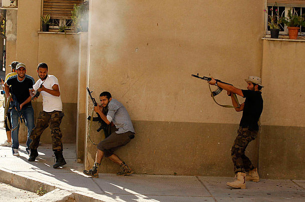 Libya's New Regime: The Fight for Gaddafi's Hometown 60