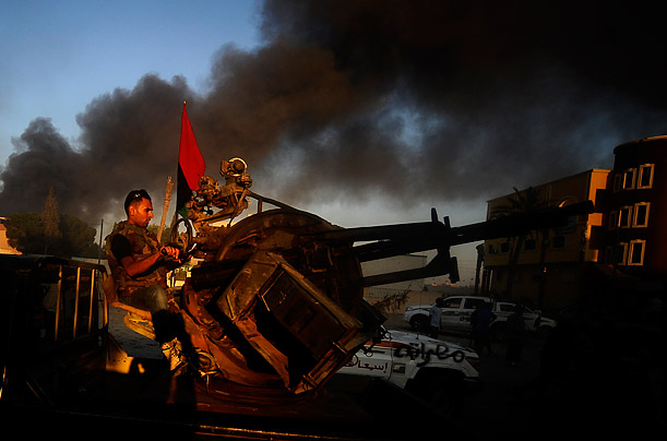 Libya's New Regime: The Fight for Gaddafi's Hometown 61