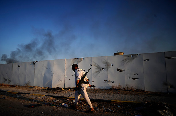 Libya's New Regime: The Fight for Gaddafi's Hometown 81
