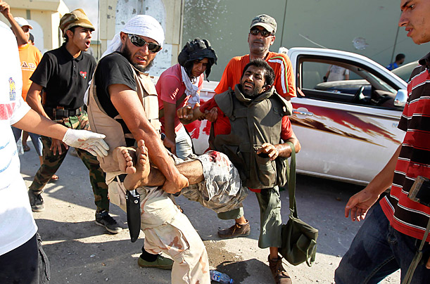 Libya's New Regime: The Fight for Gaddafi's Hometown 83