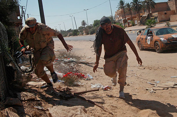 Libya's New Regime: The Fight for Gaddafi's Hometown 96