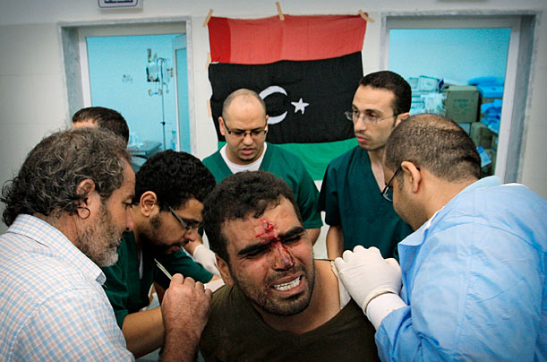 Libya's New Regime: The Fight for Gaddafi's Hometown 97