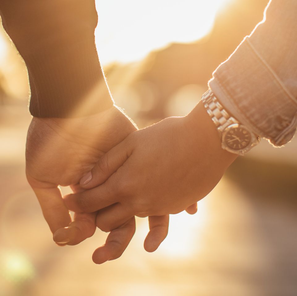 man-and-woman-holding-hands-royalty-free-image-1576698508.jpg